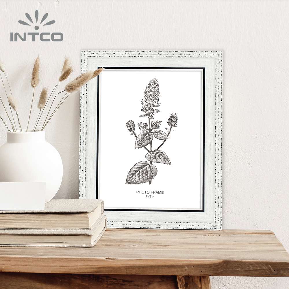add a special farmhouse touch to your decor with Intco antique white photo frame